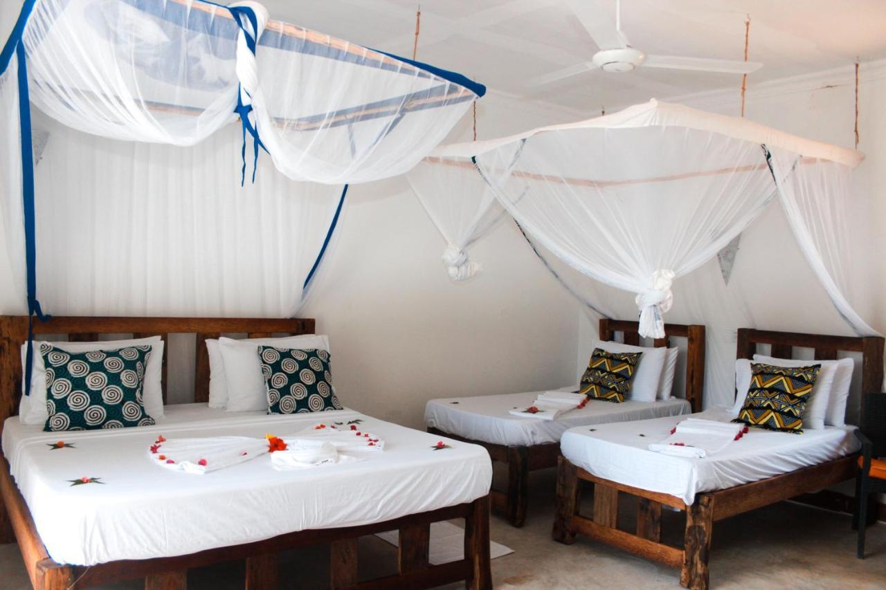 Zanzibar Kusini Beach Bungalows Hotel كيزيماكزي المظهر الخارجي الصورة