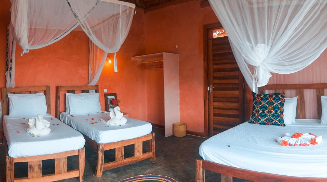Zanzibar Kusini Beach Bungalows Hotel كيزيماكزي المظهر الخارجي الصورة