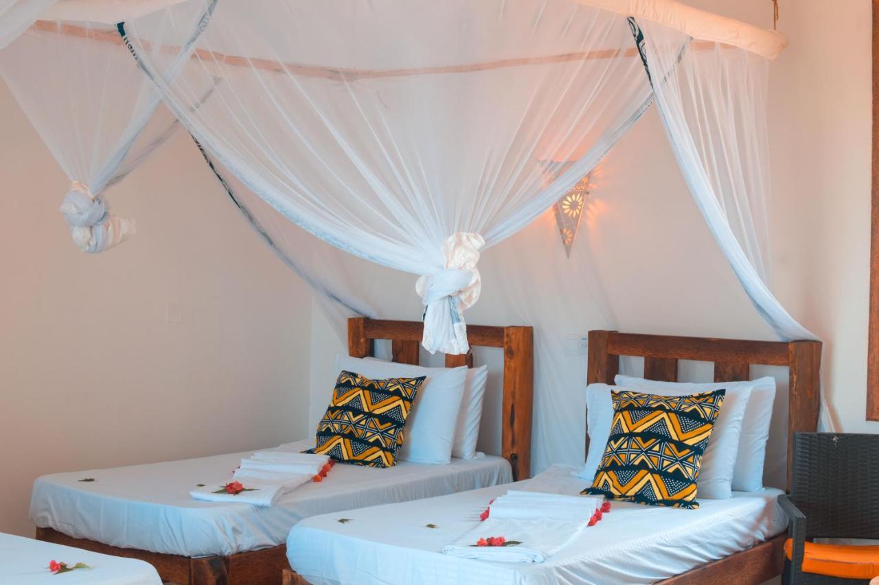 Zanzibar Kusini Beach Bungalows Hotel كيزيماكزي المظهر الخارجي الصورة