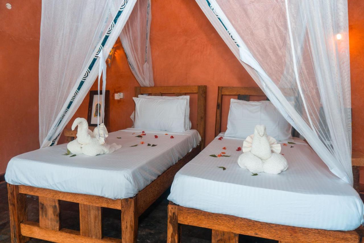 Zanzibar Kusini Beach Bungalows Hotel كيزيماكزي المظهر الخارجي الصورة