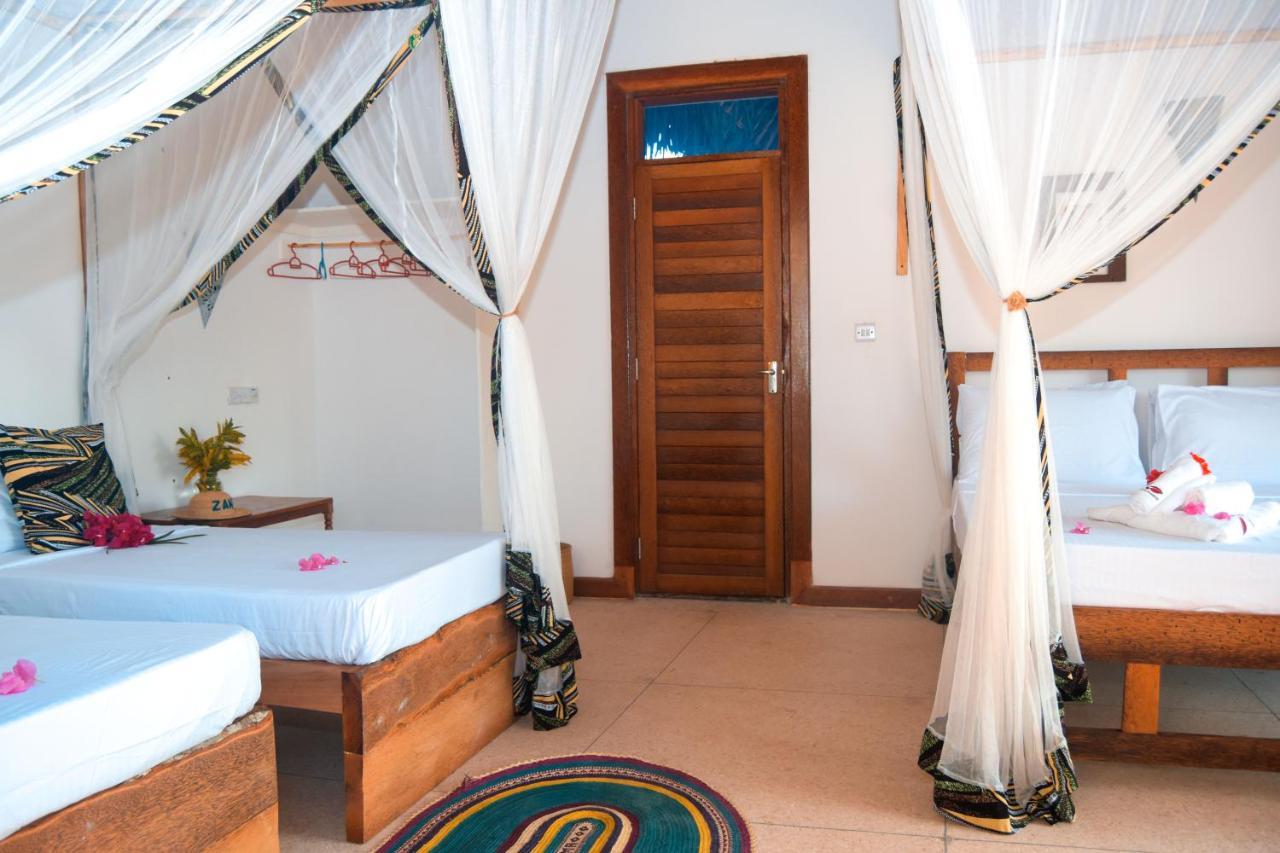 Zanzibar Kusini Beach Bungalows Hotel كيزيماكزي المظهر الخارجي الصورة