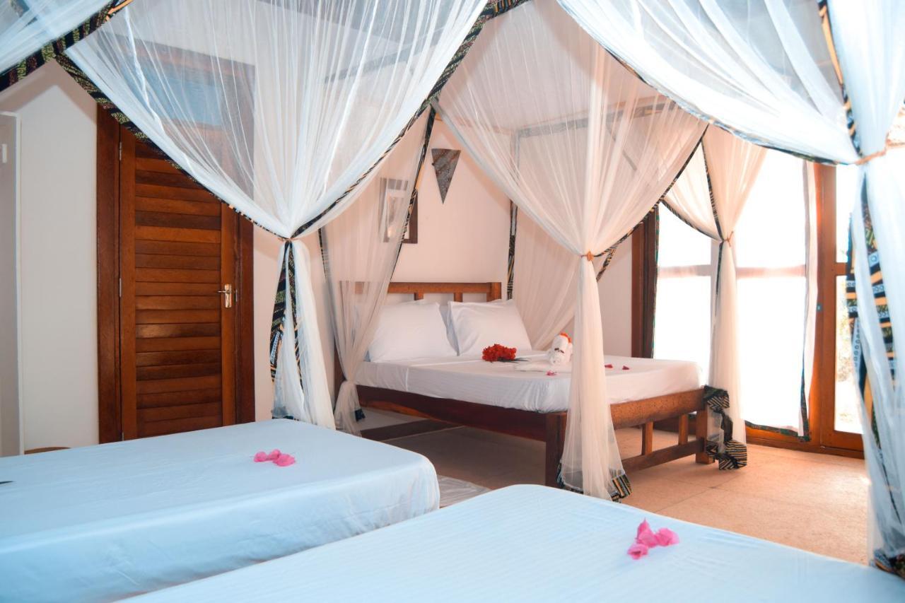 Zanzibar Kusini Beach Bungalows Hotel كيزيماكزي المظهر الخارجي الصورة