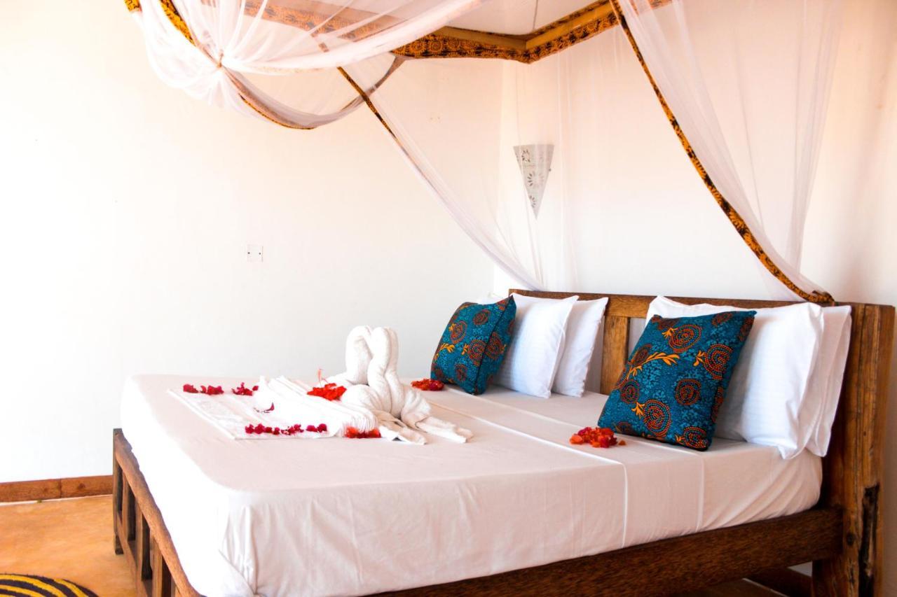 Zanzibar Kusini Beach Bungalows Hotel كيزيماكزي المظهر الخارجي الصورة