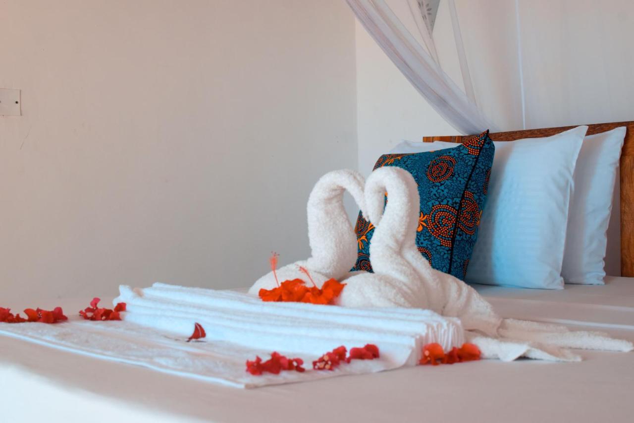 Zanzibar Kusini Beach Bungalows Hotel كيزيماكزي المظهر الخارجي الصورة