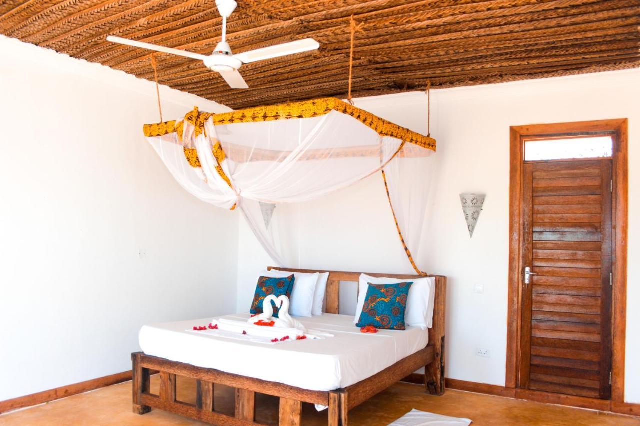 Zanzibar Kusini Beach Bungalows Hotel كيزيماكزي المظهر الخارجي الصورة