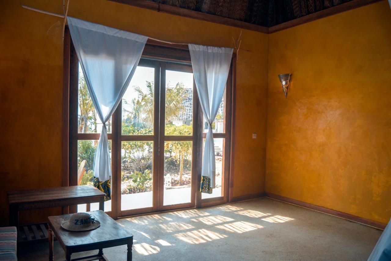 Zanzibar Kusini Beach Bungalows Hotel كيزيماكزي المظهر الخارجي الصورة