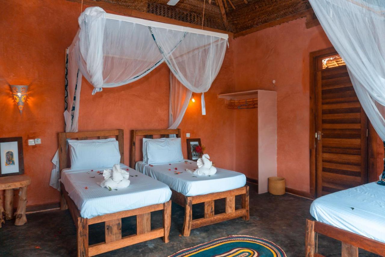 Zanzibar Kusini Beach Bungalows Hotel كيزيماكزي المظهر الخارجي الصورة