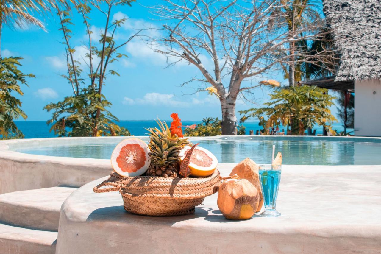 Zanzibar Kusini Beach Bungalows Hotel كيزيماكزي المظهر الخارجي الصورة